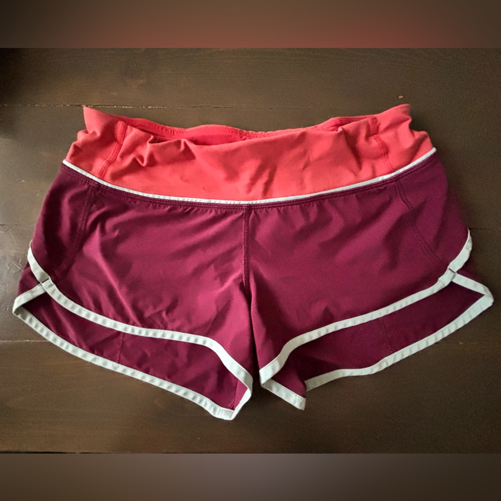 Rare plum and coral LuluLemon SPEEDUPS. Size 4. Gently worn